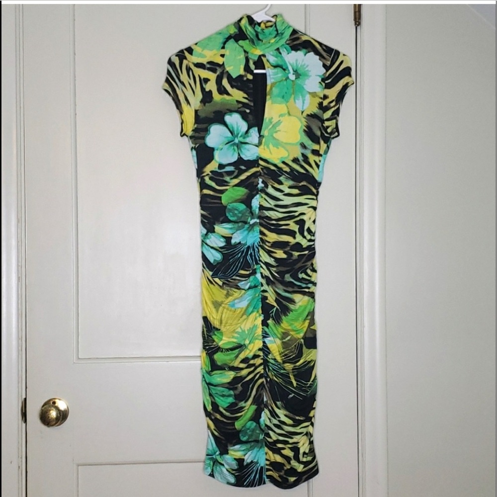 Stunning tropical Animal Print dress with peep hole in front